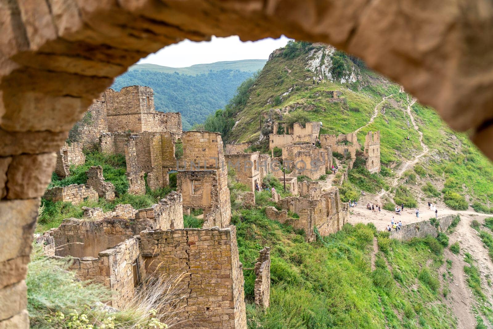 Dagestan Gamsutl. Ancient ghost town of Gamsutl old stone houses in abandoned Gamsutl mountain village in Dagestan, Abandoned etnic aul, summer landscape