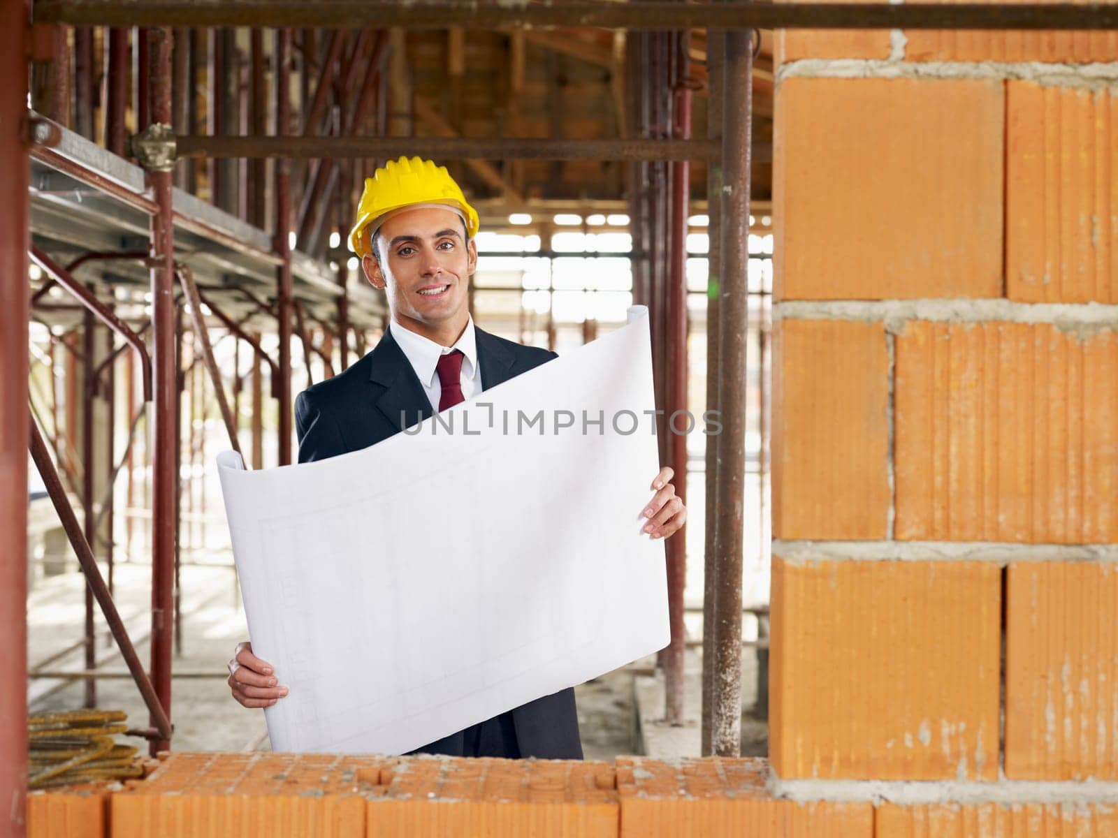 architect with building plans