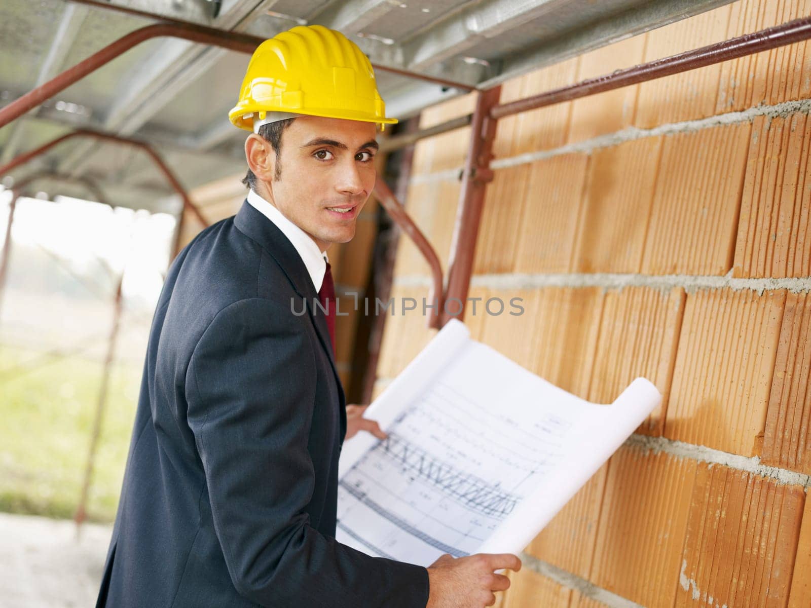 architect with building plans