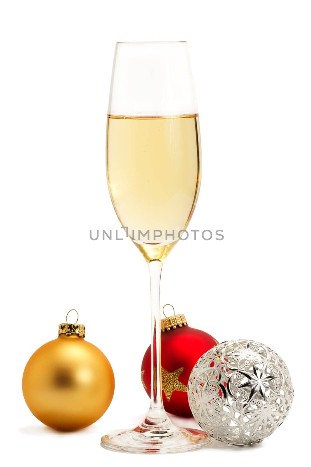 Sparkling wine with three Christmas tree baubles