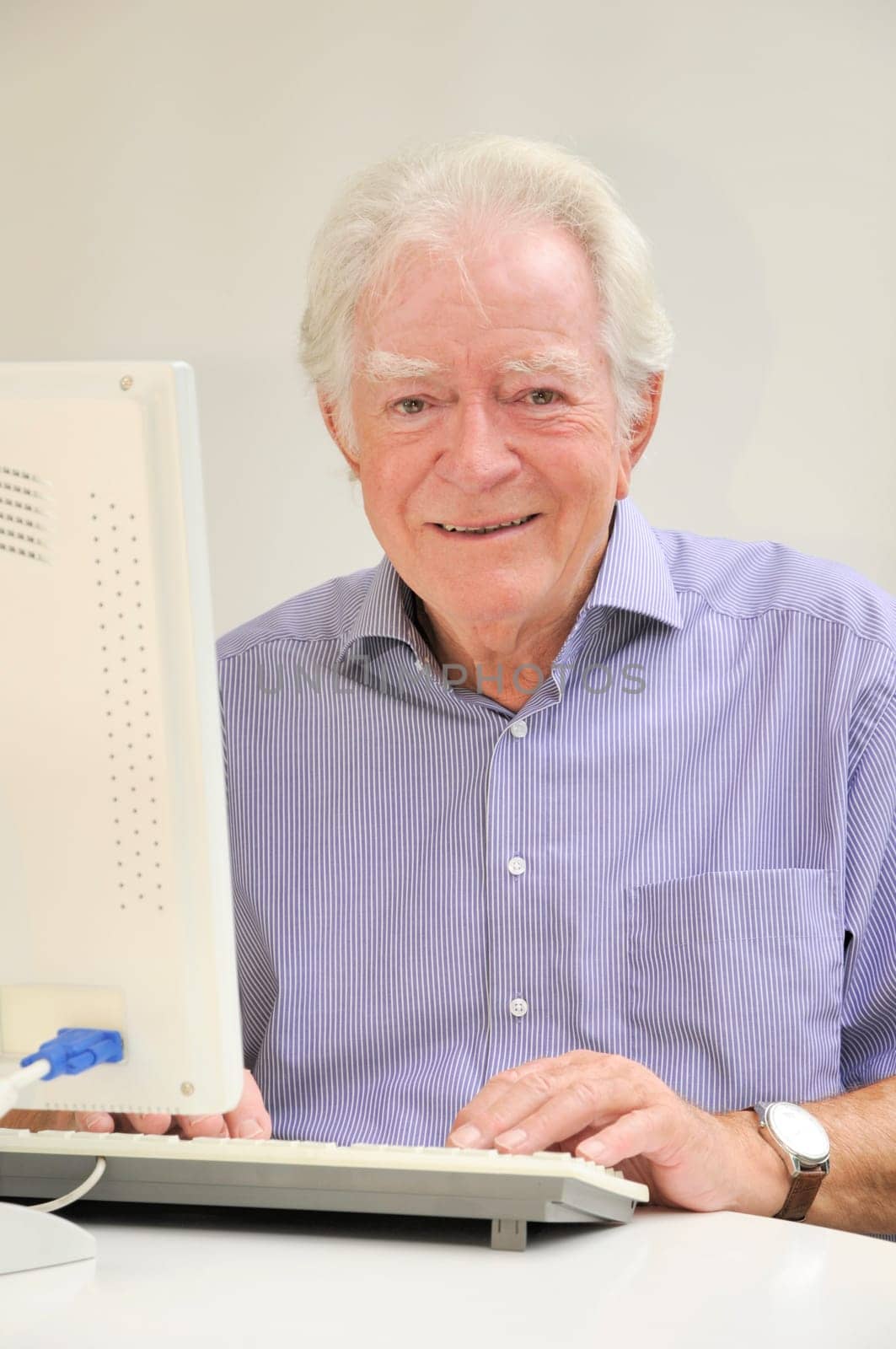 Senior with computer