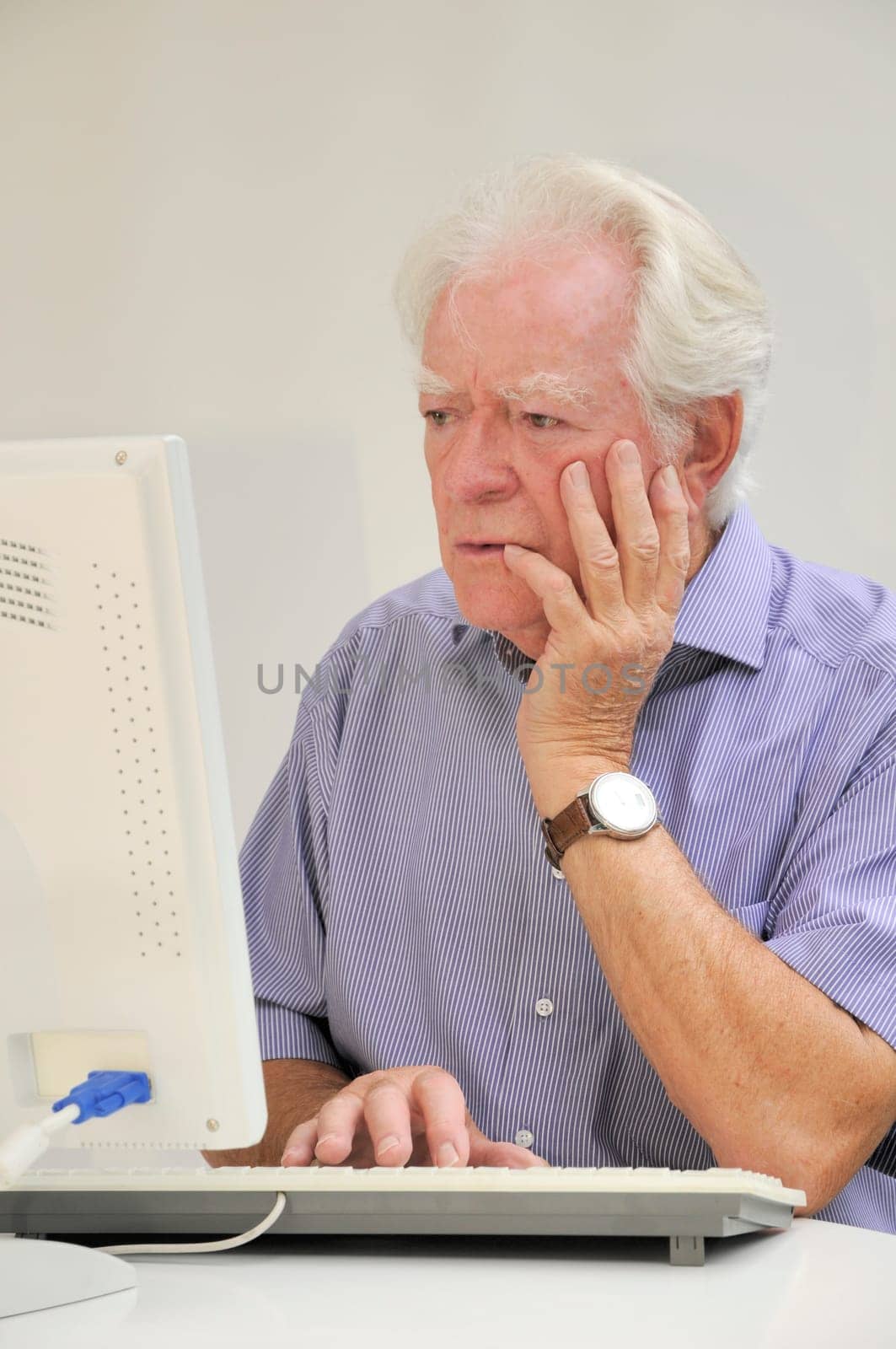 Senior with computer