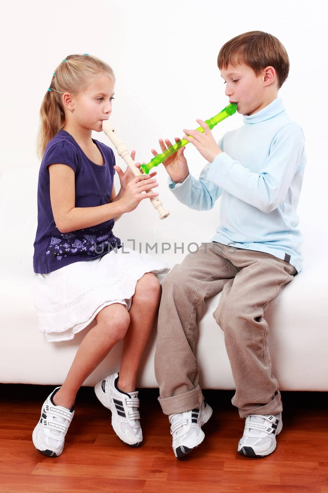 Kids playing flute