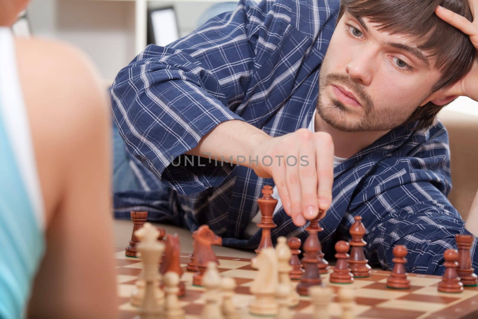 couple playing chess