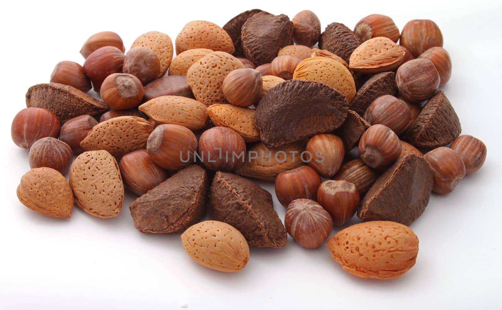 Mixt nuts on a plain white background.