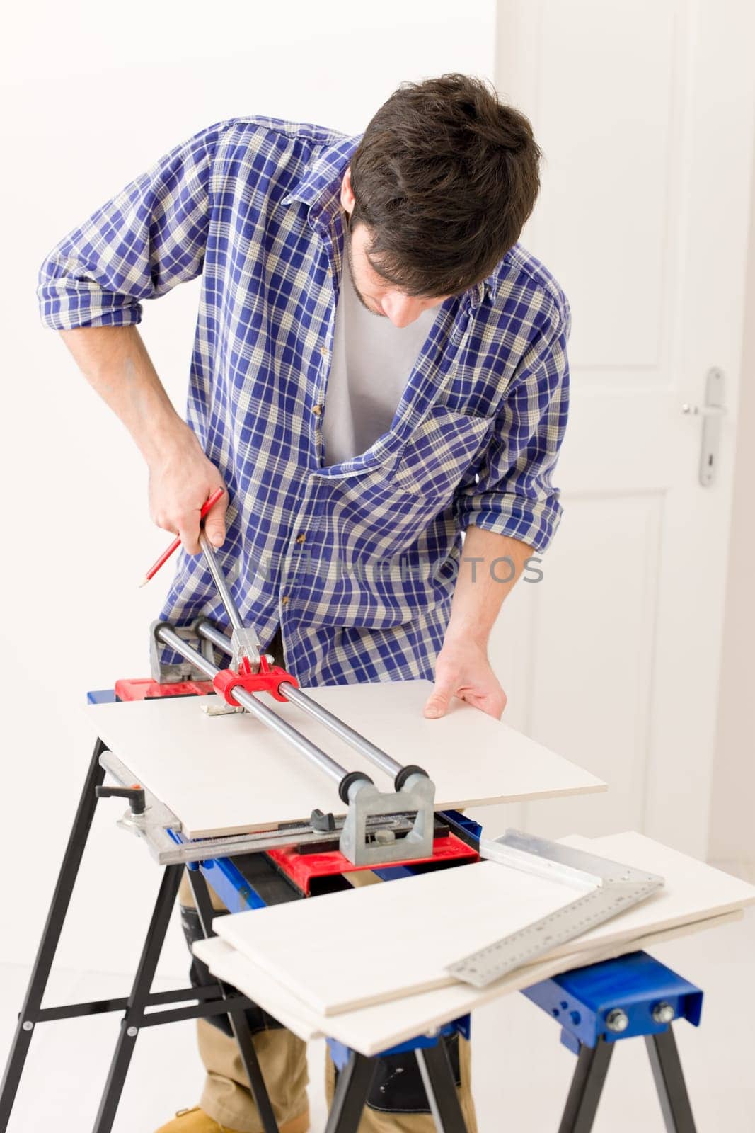 Home improvement - handyman cut tile