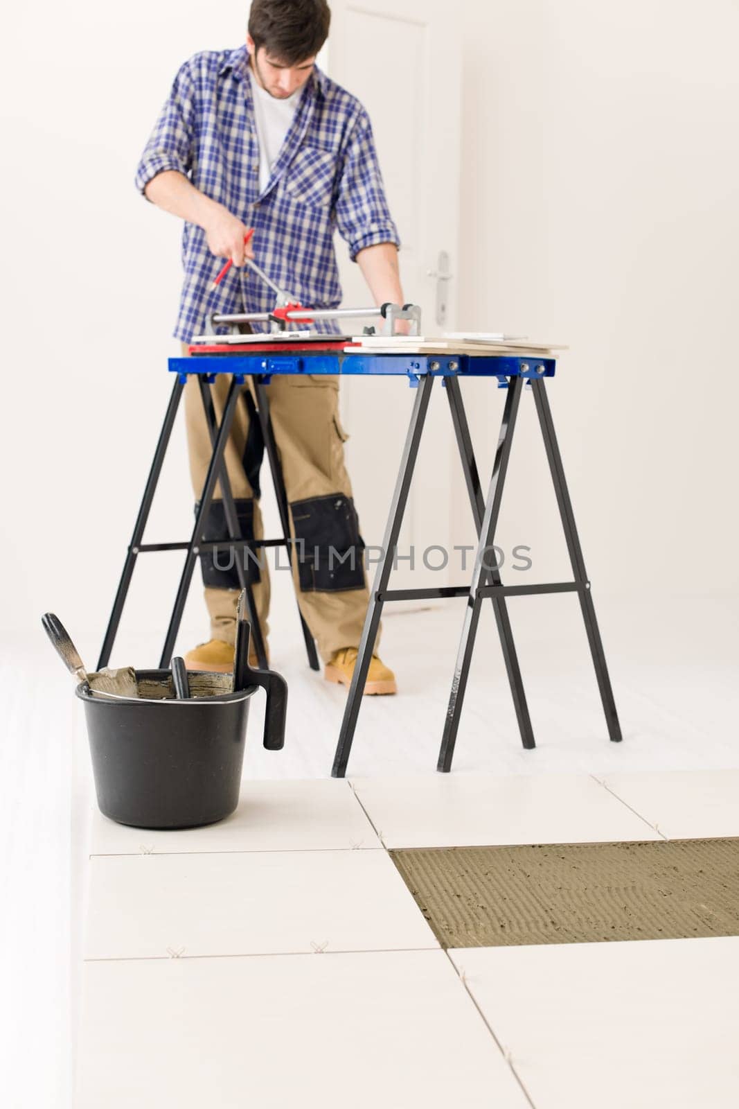 Home improvement - handyman cut tile