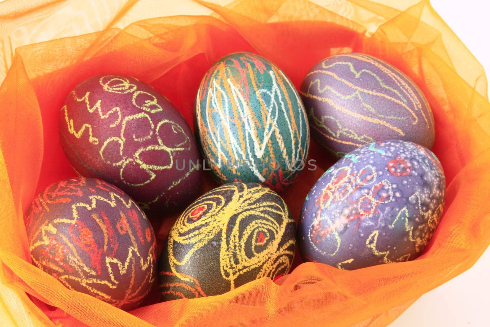 six brightly painted Easter eggs