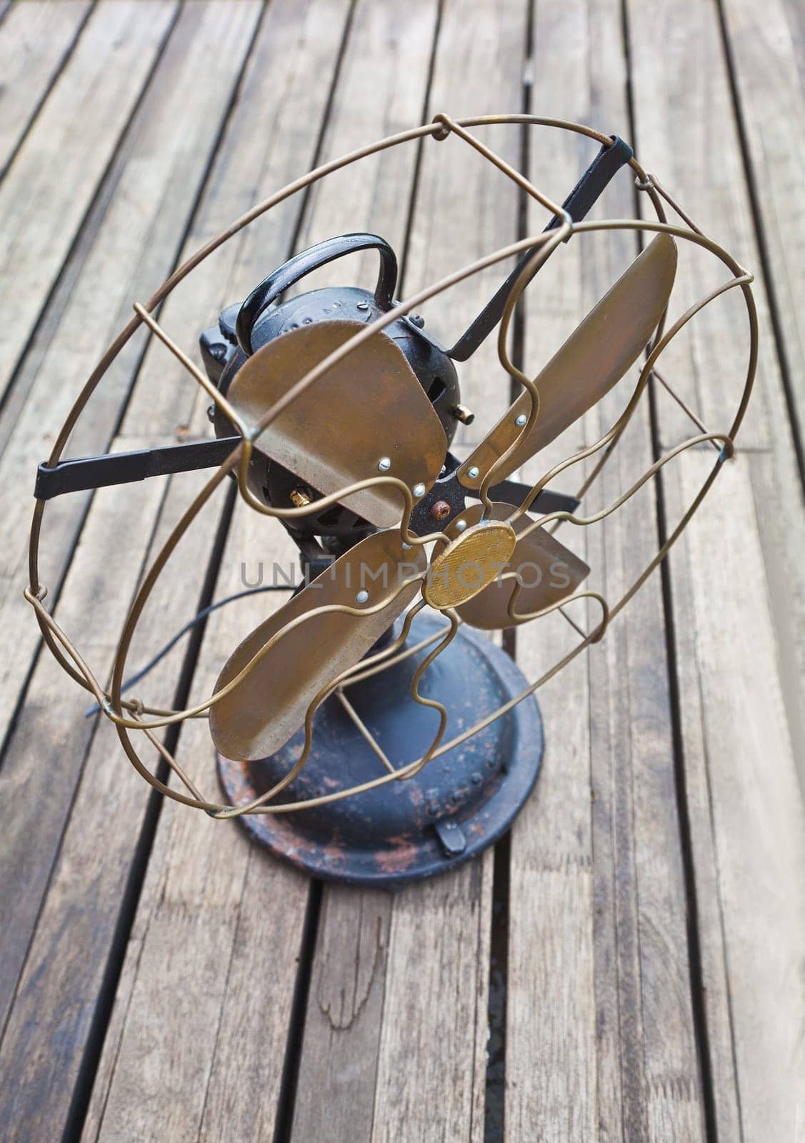 seasoned decking with an old fan