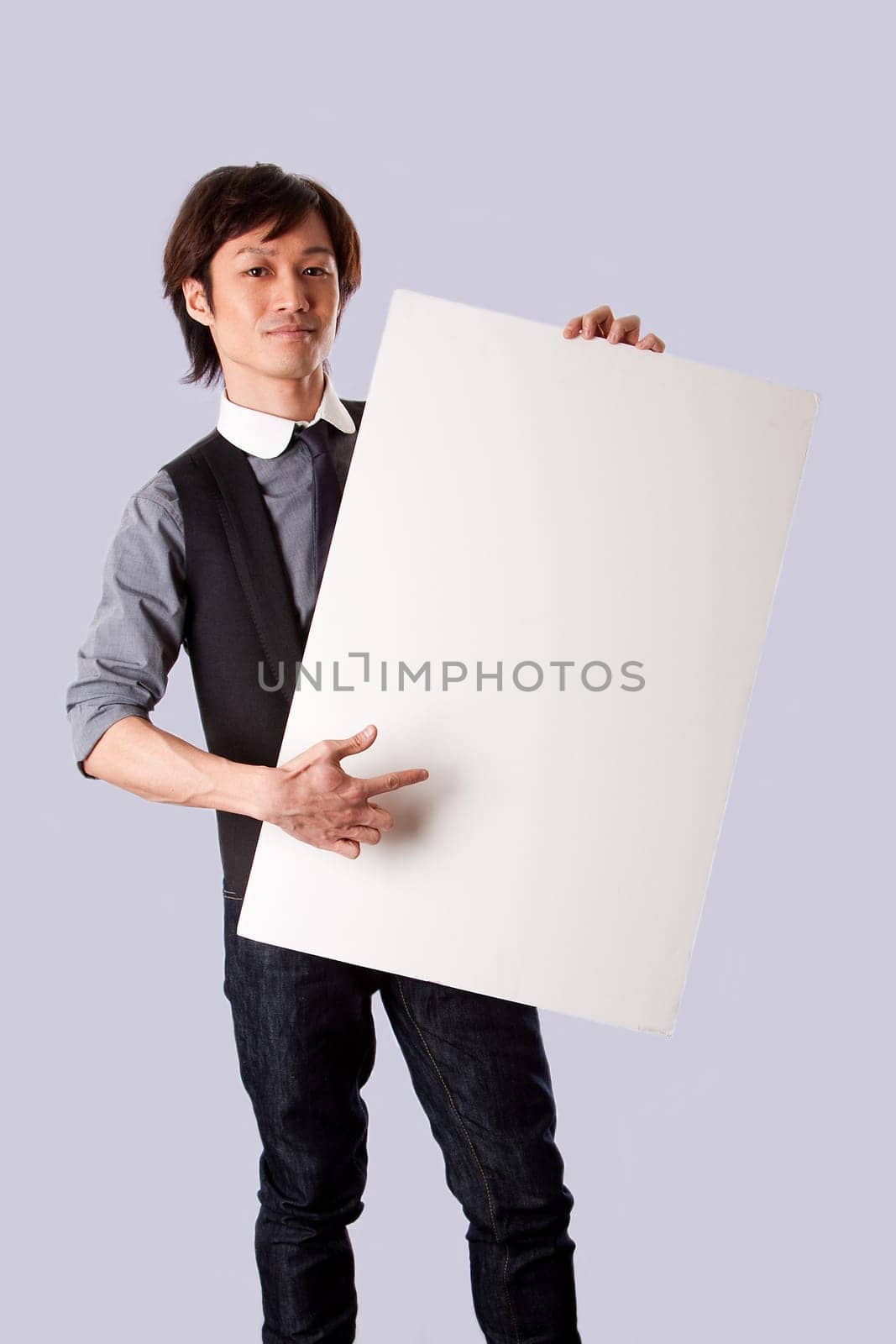 Asian business man pointing whiteboard