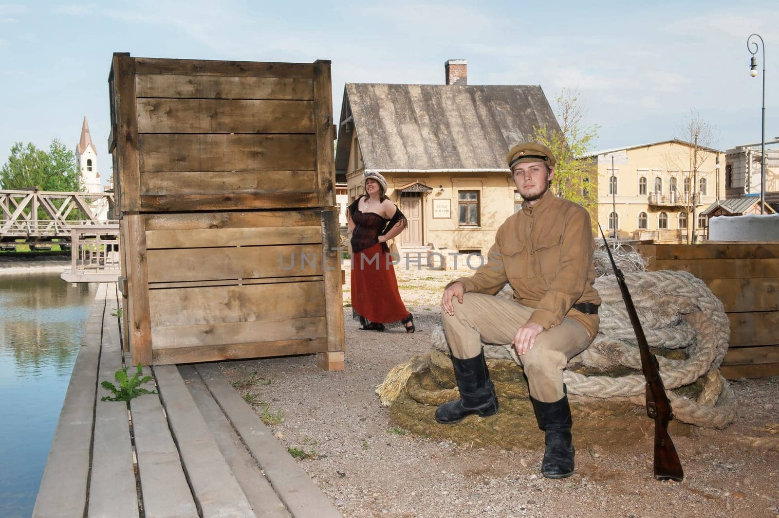 Lady and soldier with  gun in retro styl