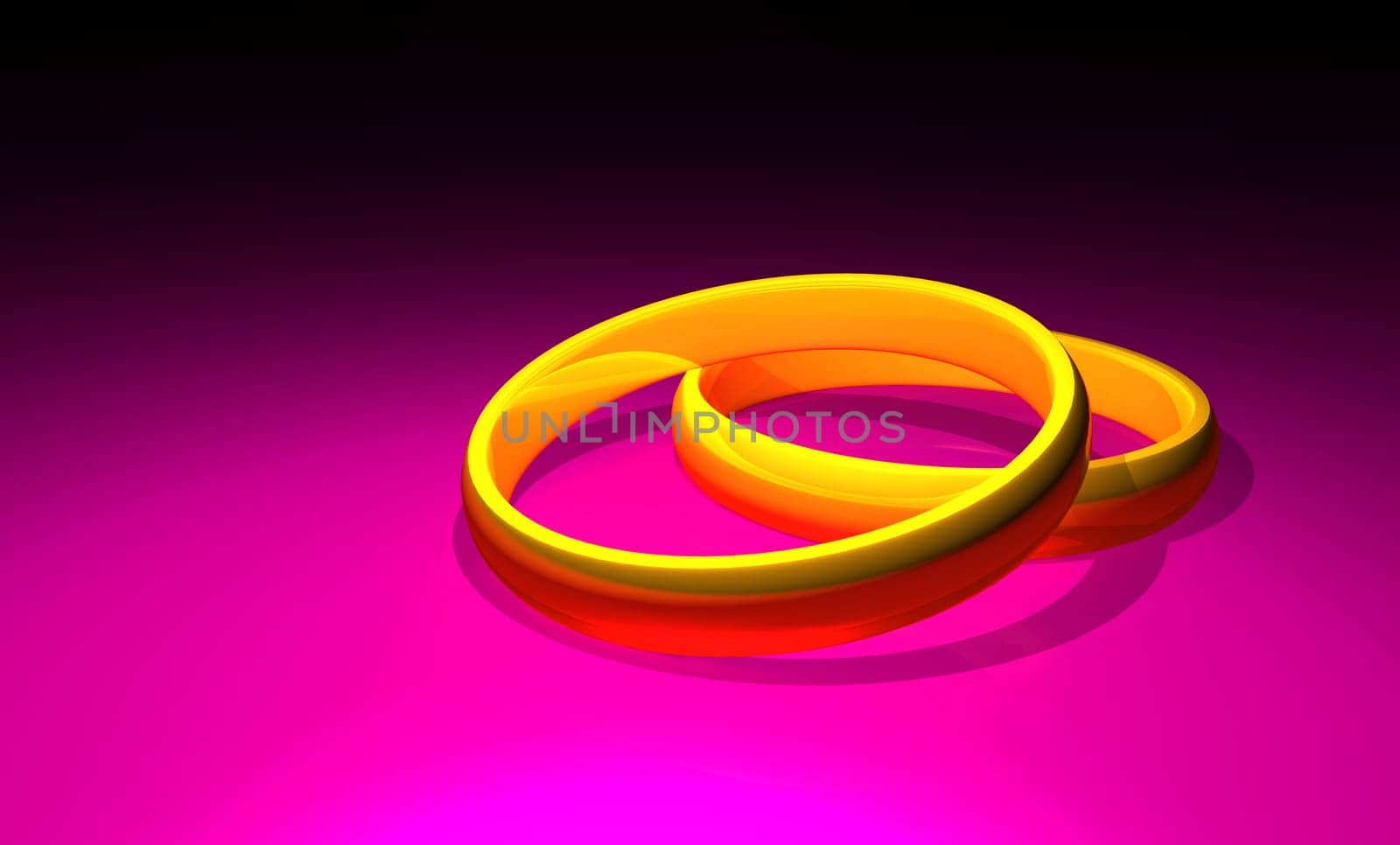 Two gold wedding rings on pink