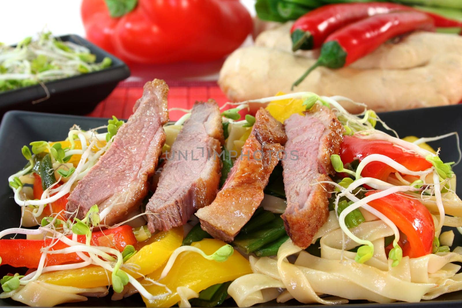 Duck breast with fried noodles