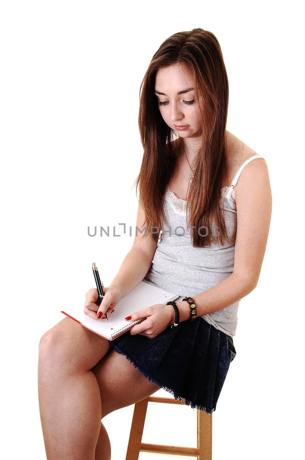 Young girl sitting.