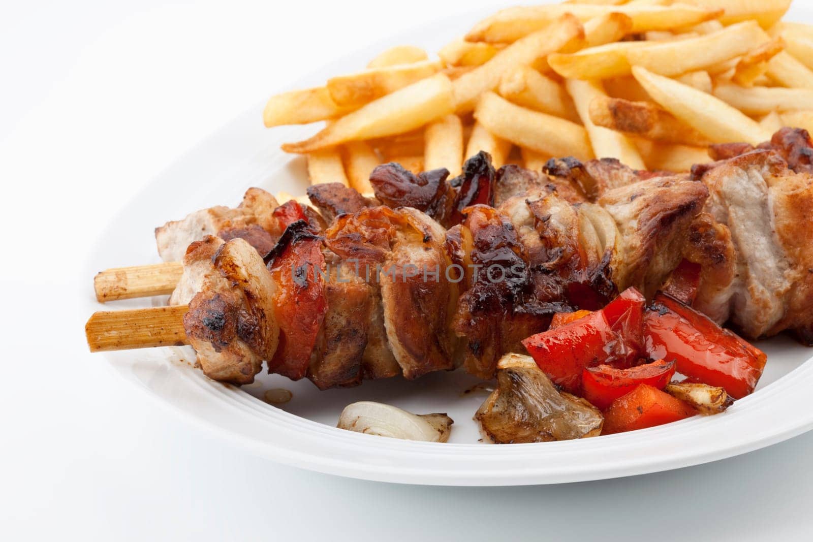 Meat skewers and French fries