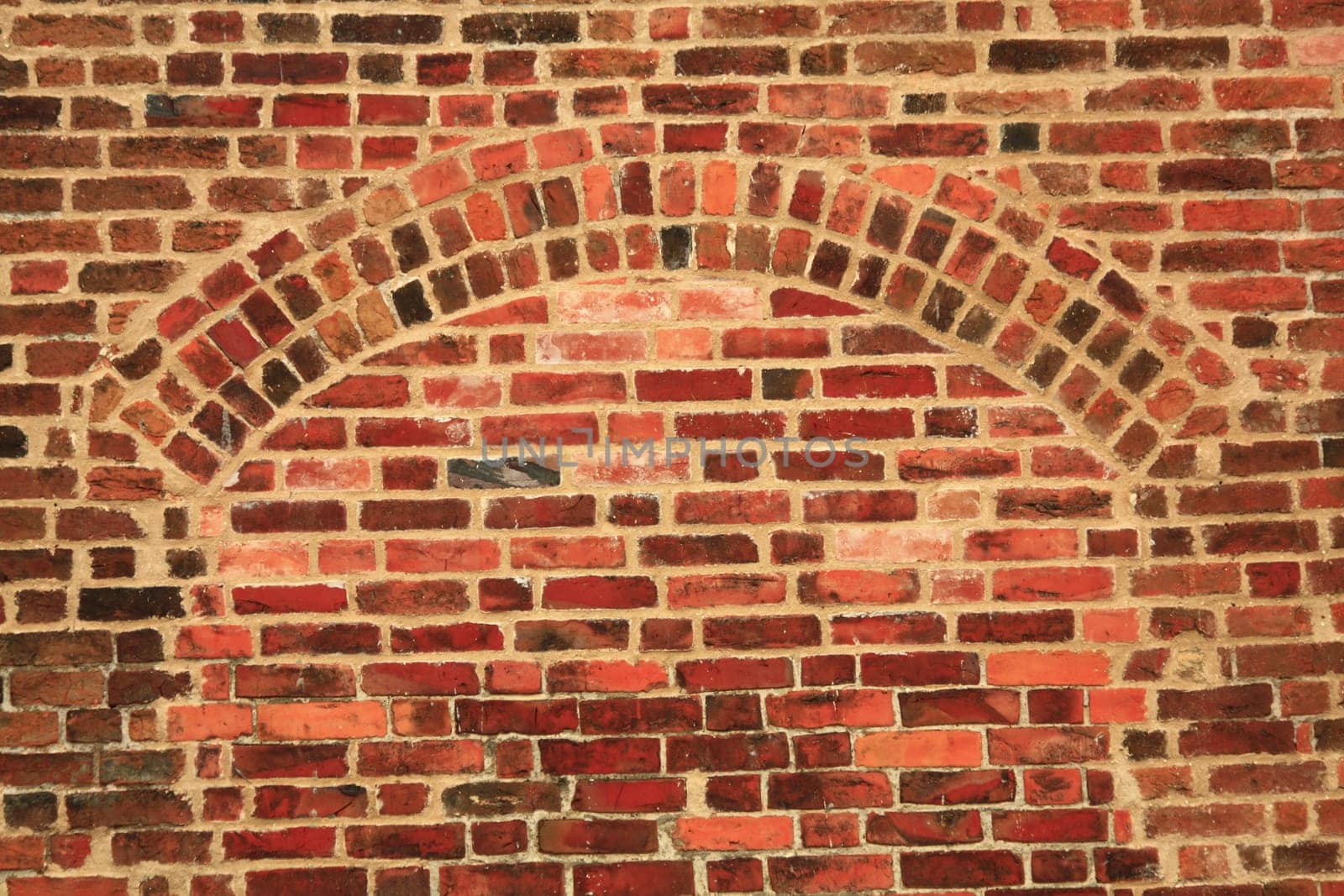 Brick wall with arch