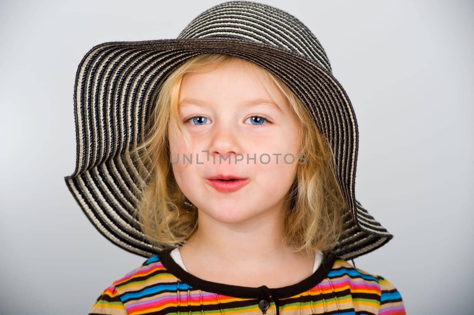 little girl with red hat