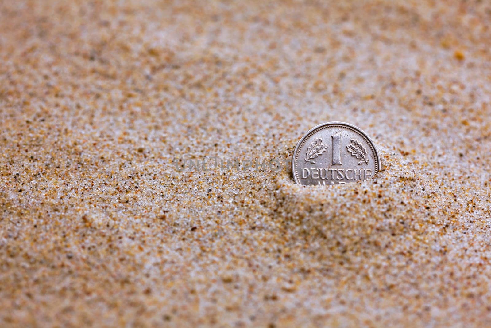 D-Mark put in the sand .....