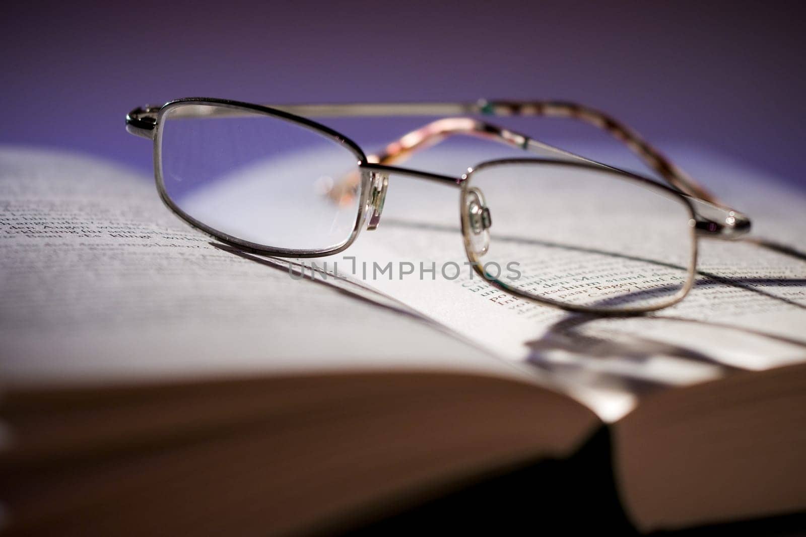 Glasses on book