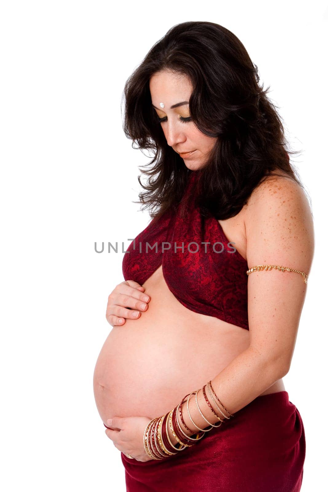 Pregnant woman holding belly