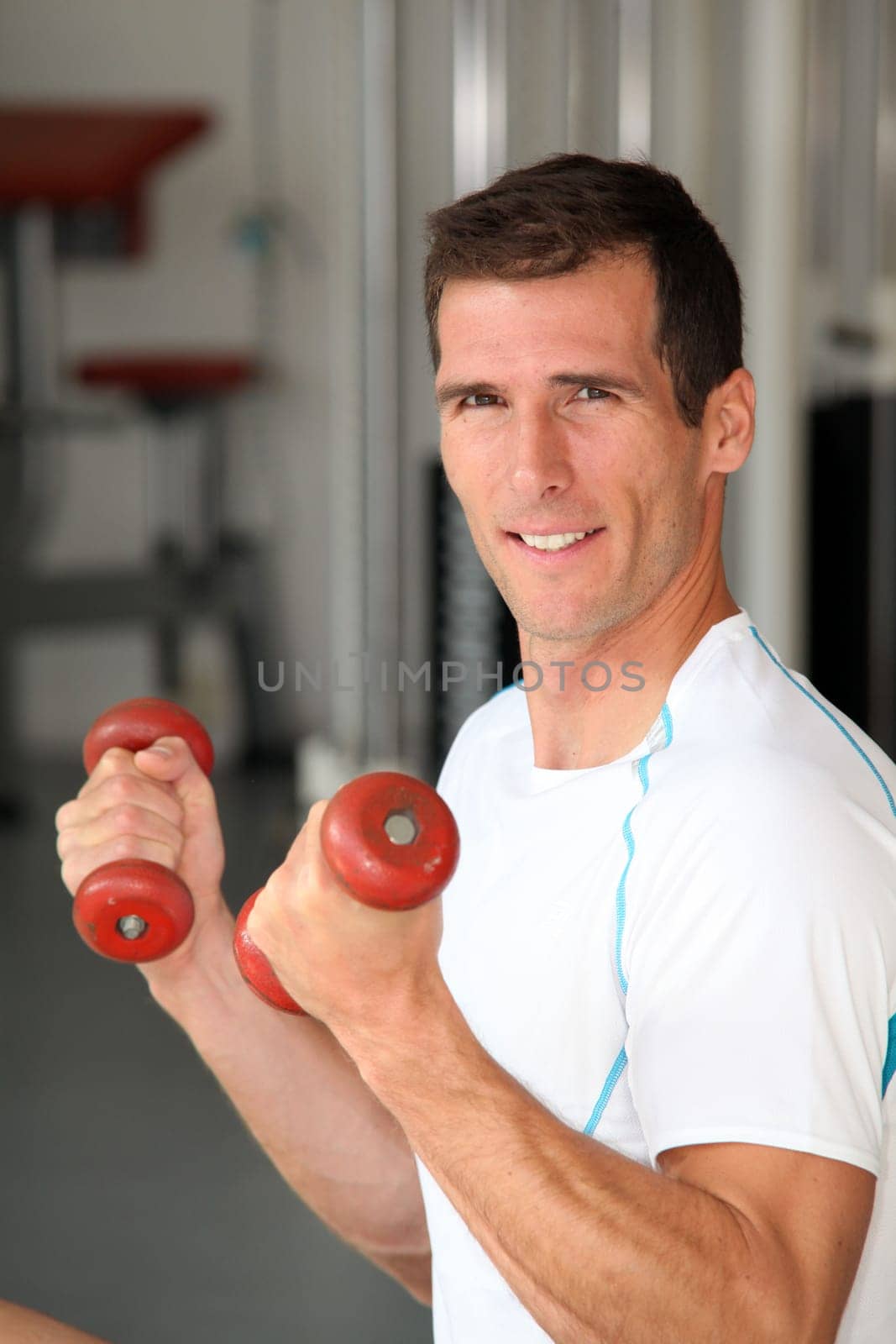 Closeup of man working out in gym