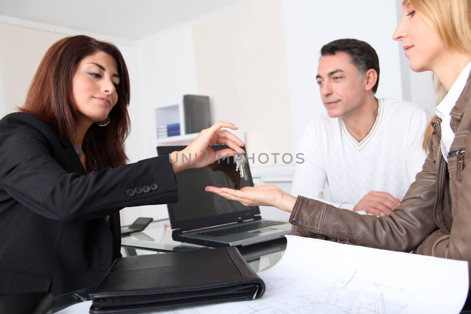 Property owners getting keys of their home