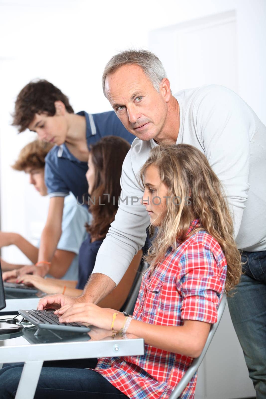 Teenagers in computing class