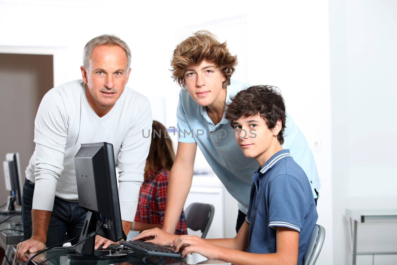 Teenagers in computing class