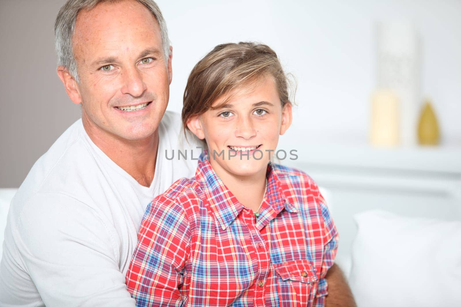 Closeup of father and daughter at home