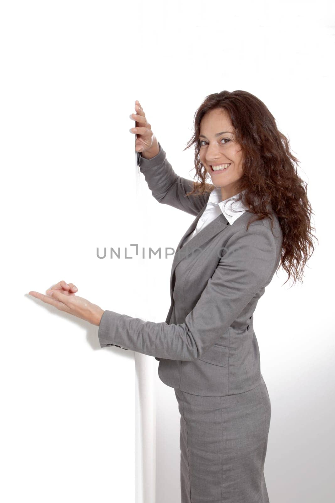 Businesswoman doing expressions on white background