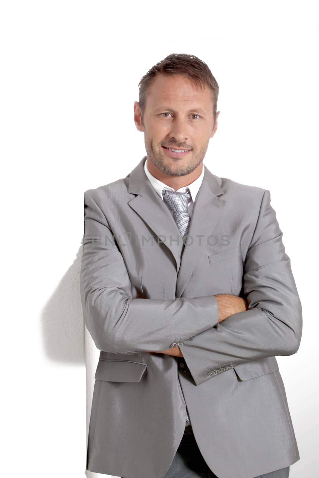 Businessman doing expressions on white background