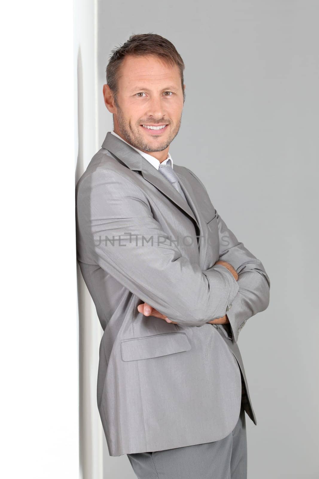 Businessman doing expressions on white background