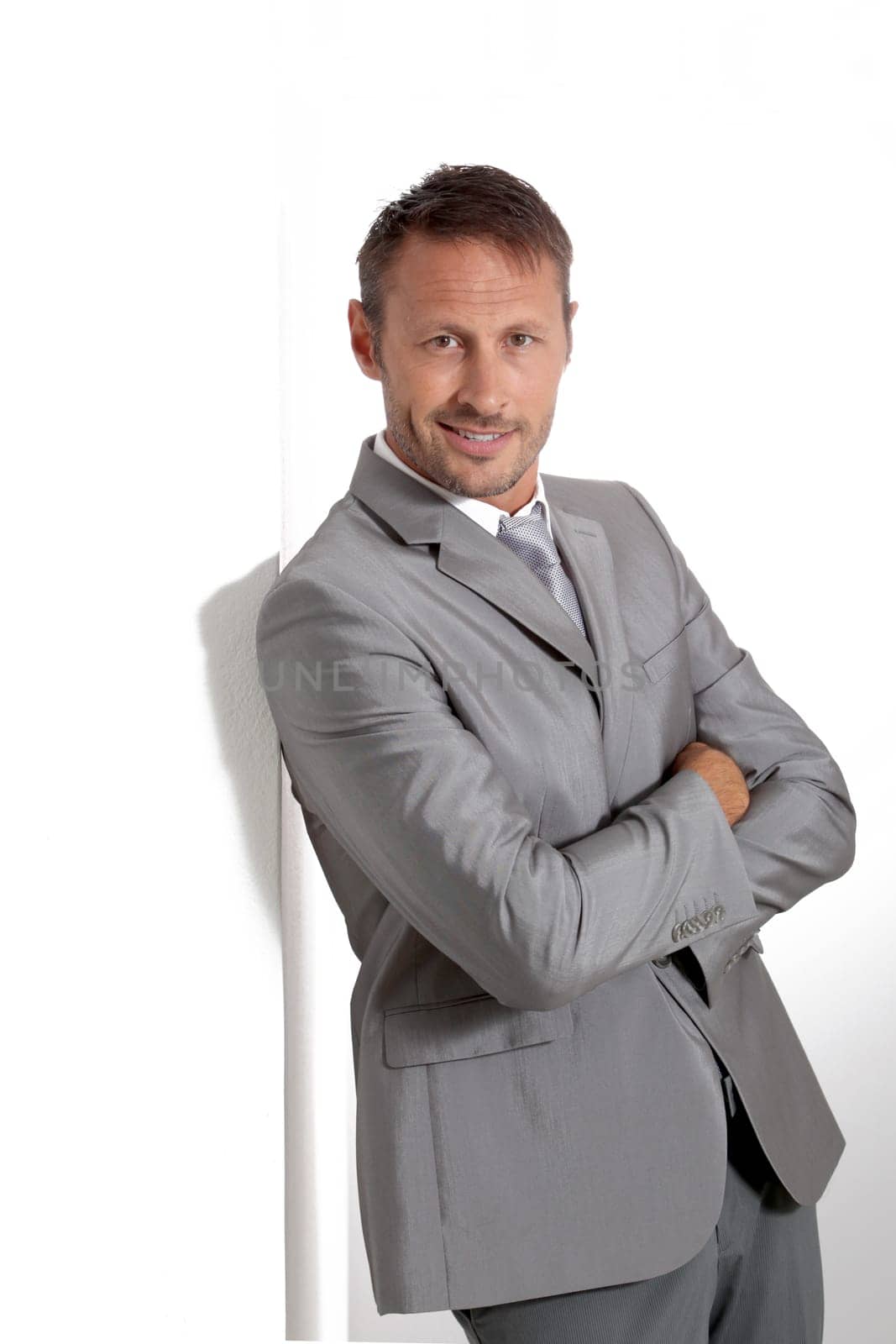 Businessman doing expressions on white background