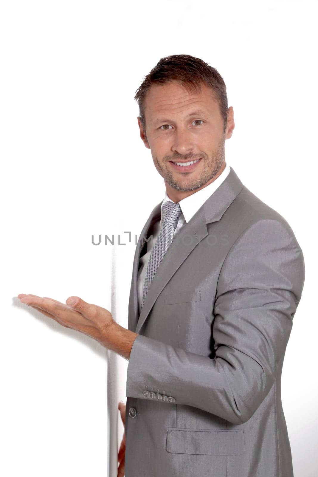 Businessman doing expressions on white background