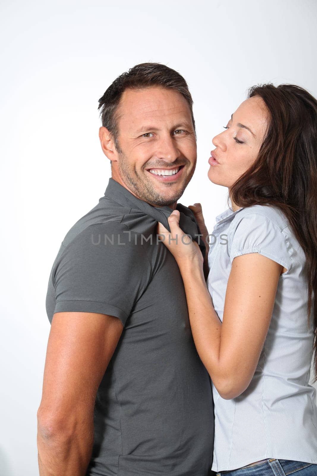 Woman pulling on her boyfriend neck