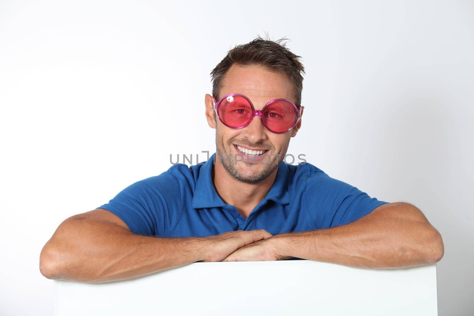 Funny guy with white message board