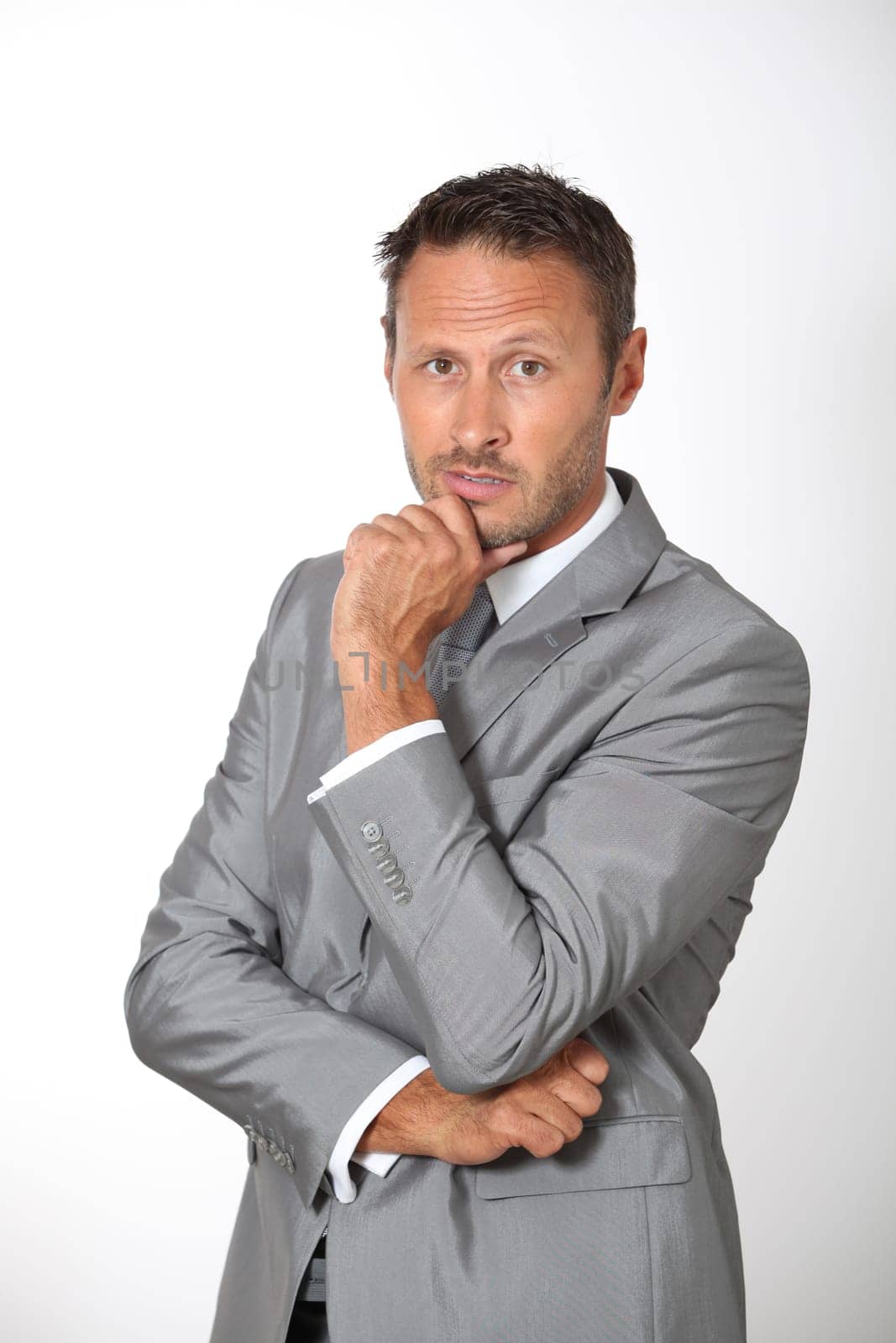 Businessman standing in white background