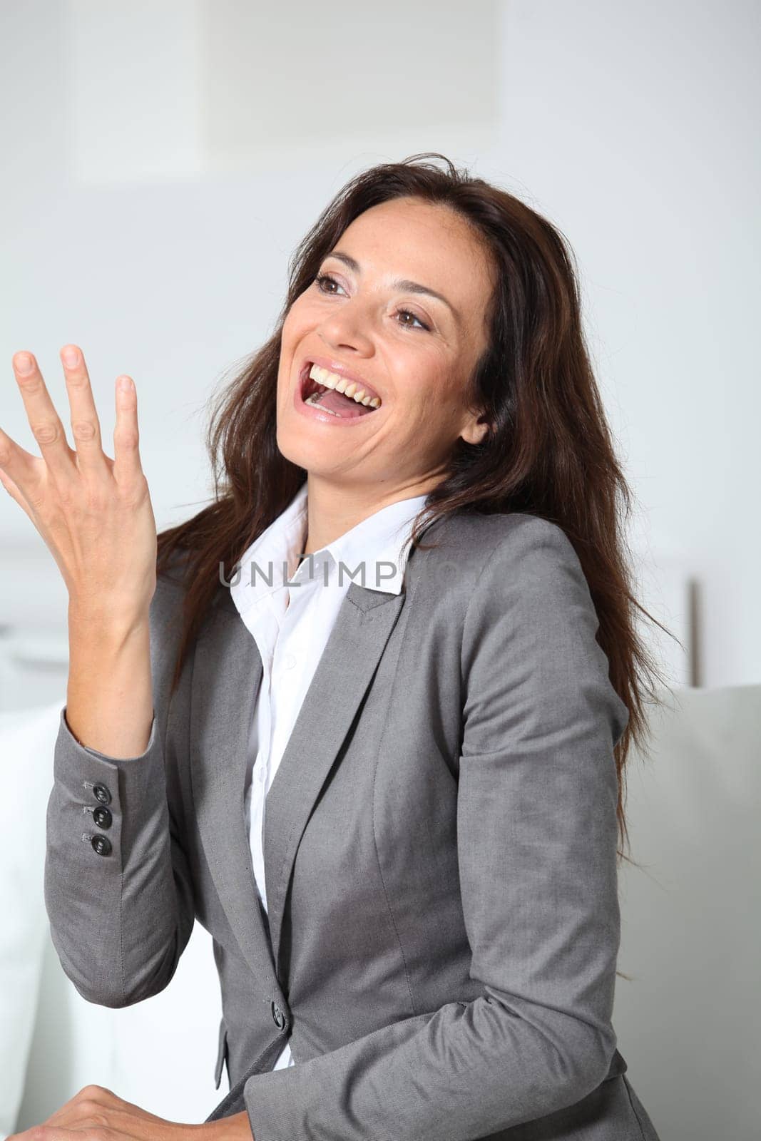 Businesswoman talking with hands