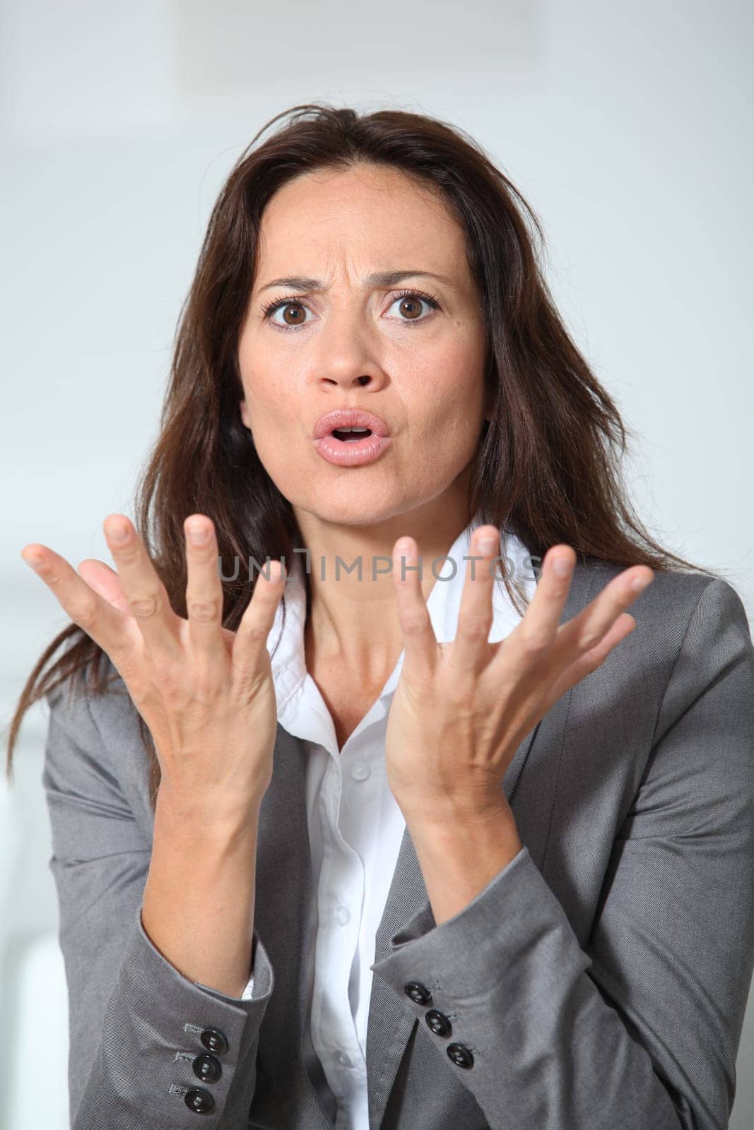 Businesswoman with misunderstanding look