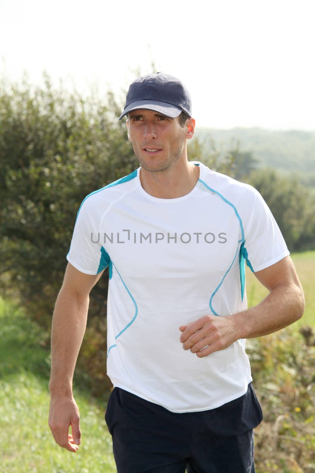 Closeup of man running outside