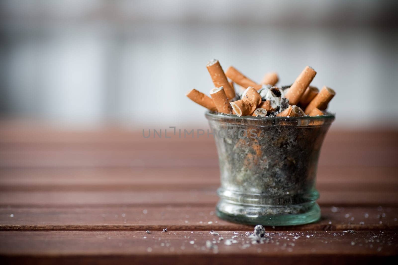 ashtray full with butts