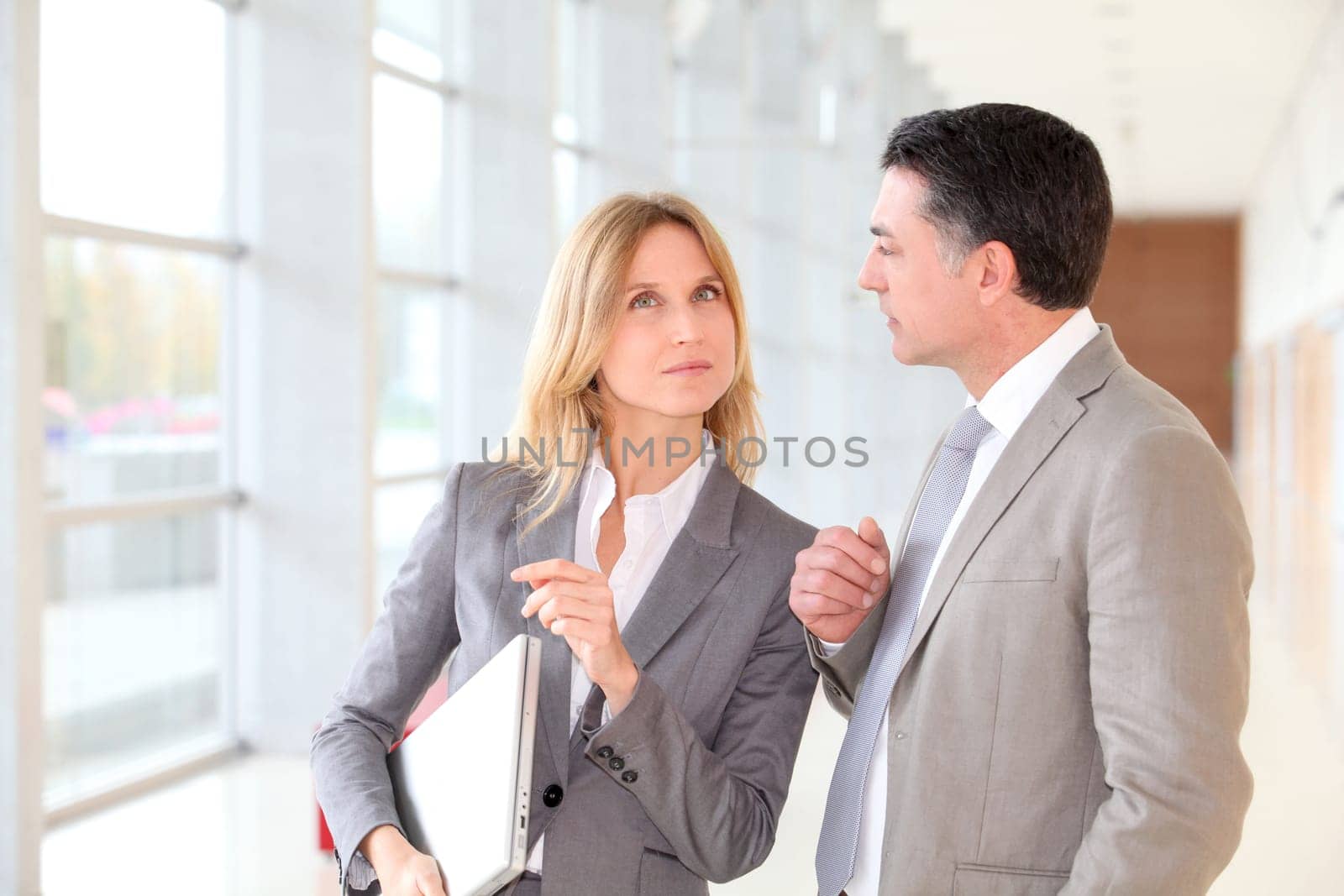Business partners meeting in modern building