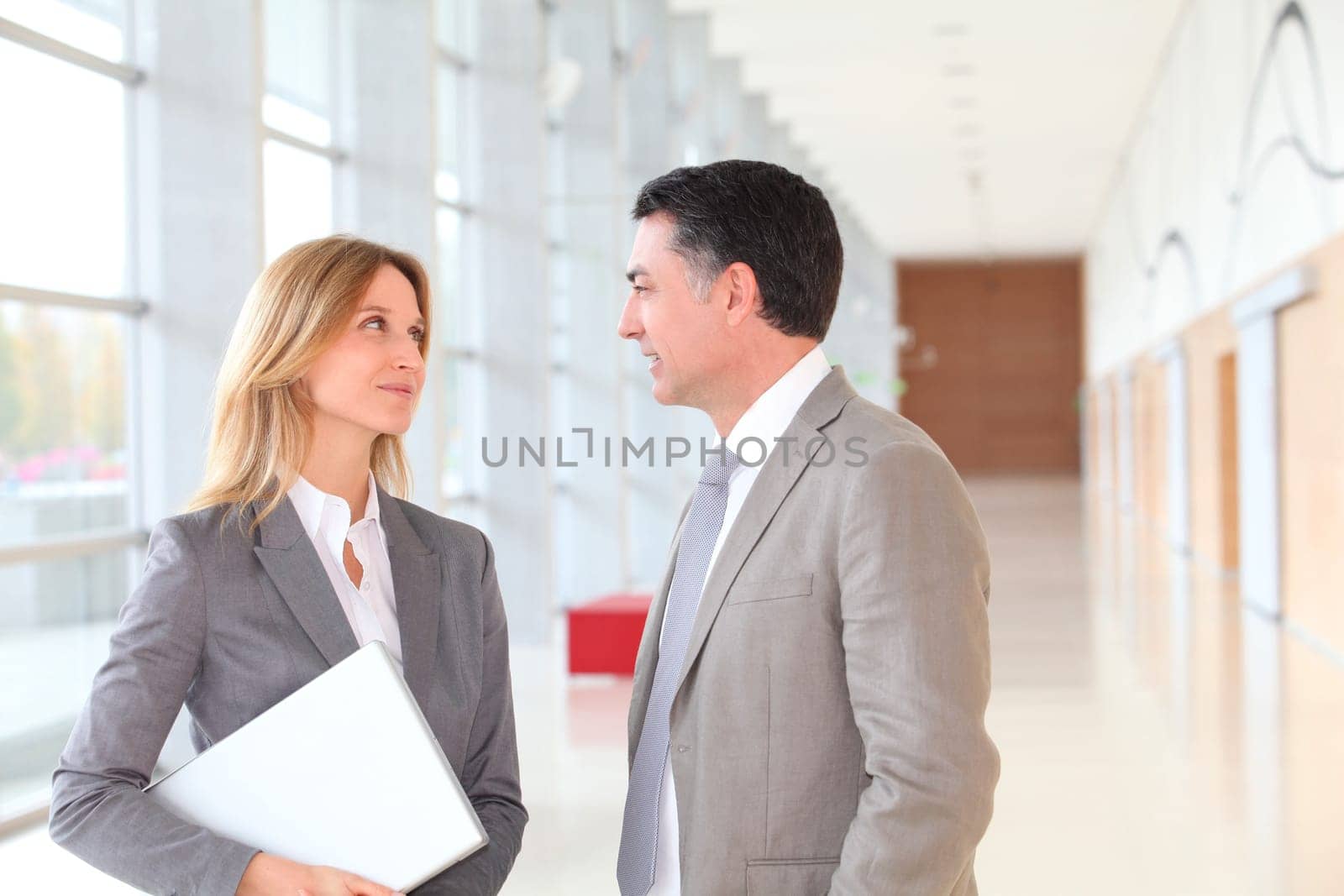 Business partners meeting in modern building