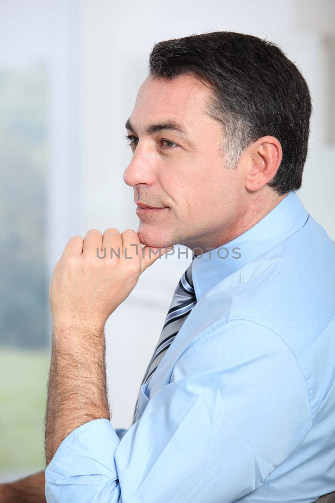 Closeup of businessman with blue shirt and tie