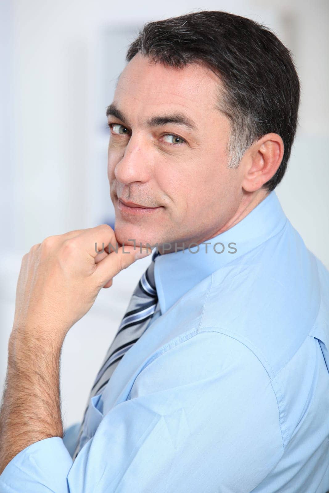 Closeup of businessman with blue shirt and tie