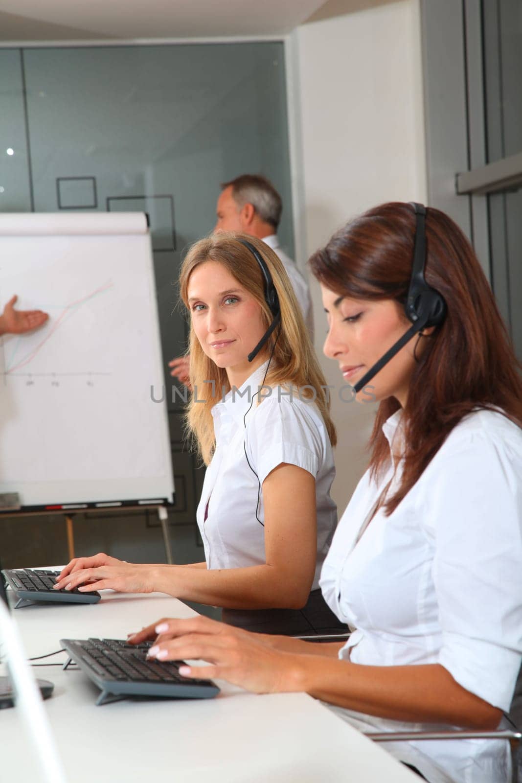Group of people attending business presentation