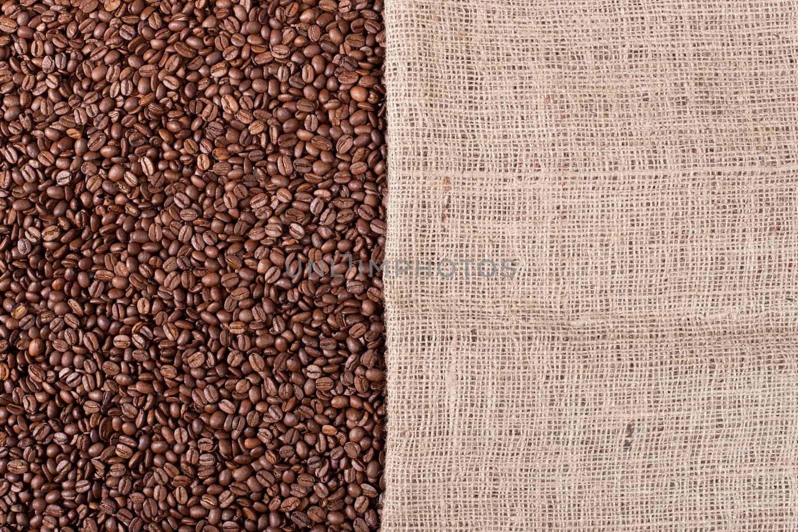 Coffee background with beans and a canvas