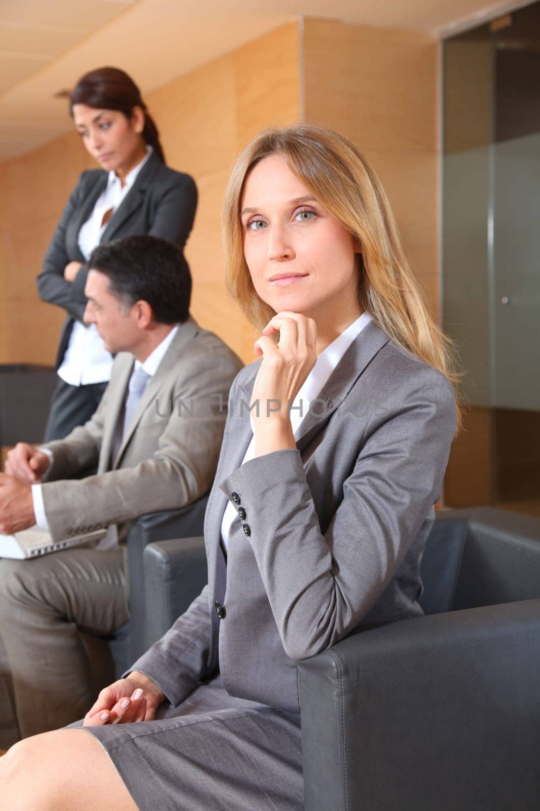 Group of associates meeting in lounge