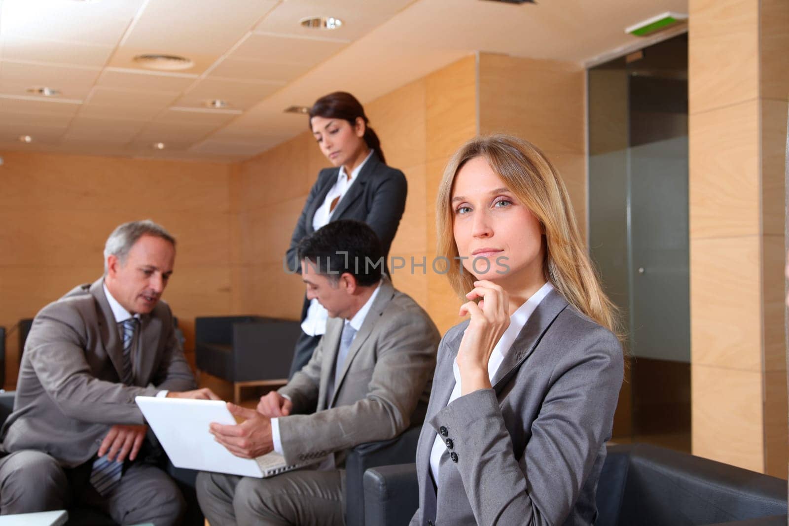 Group of associates meeting in lounge