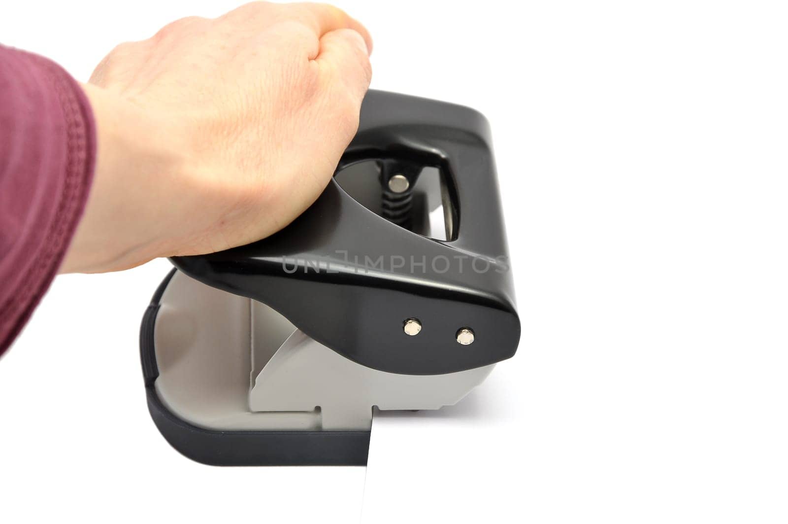 Hand with hole punch